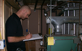 Heating System Upgrades: guy w/ clipboard