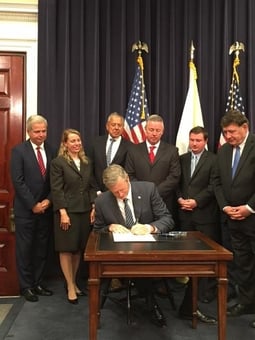 Gov._Baker_signing_exec_order-747521-edited.jpg