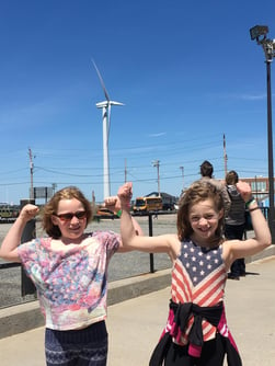 Hull, taken by Loie Hayes, 2017 tour, wind turbine, kids, strong, smiles, america, usa