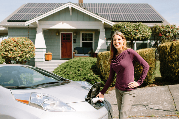 EV, drive green, female, charging, solar